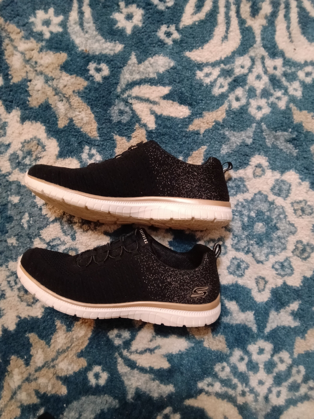 Skechers Black Knit Slip-On Sneakers with White Sole